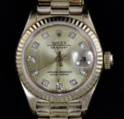 A lady's 1980's 18ct gold and diamond Rolex Oyster Perpetual Datejust wrist watch, with diamond