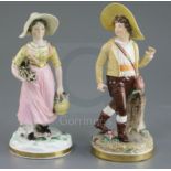 A matched pair of Rockingham porcelain figures of a Swiss boy and Swiss girl, c.1830, incised