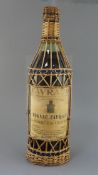 A 5 litre bottle of Cognac Favraud Chateau de Souillac, label listing prize medals up to 1908,