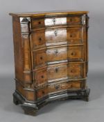 A late 17th century North Italian walnut chest five graduated long drawers with inverse breakfront