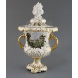 A fine Rockingham porcelain pot pourri vase and cover, c.1830-42, finely painted with a titled