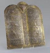 Judaica: A 19th century Cairoware arched plaque inscribed with the Ten Commandments, width 11.25in.,