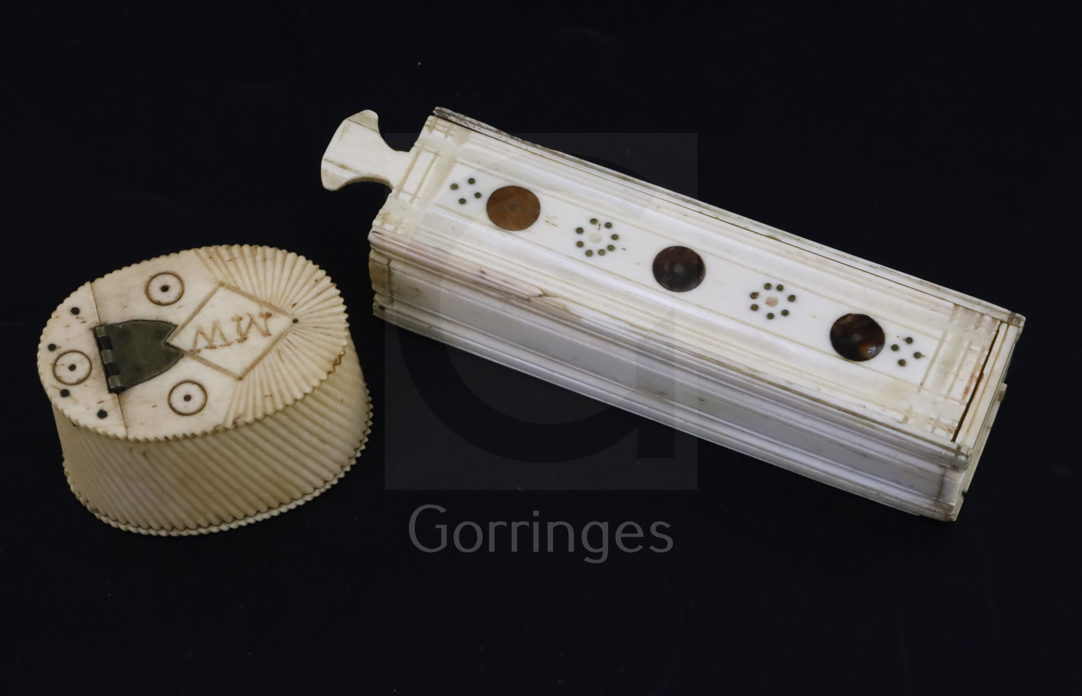 An early 19th century set of bone domino's, each 1 inch, housed in the original bone box with inlaid
