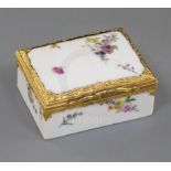 A Meissen gold mounted table snuff box, mid 18th century, the exterior painted with Deutsche Blumen,