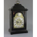 John Rowe, London (1714-1727). A George I ebonised pearwood hour repeating bracket clock, the 6 inch