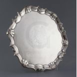 A George II silver salver by Robert Abercrombie, of shaped circular form, with engraved armorial and