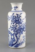 A Chinese blue and white cylindrical vase, Kangxi period, painted with flowering branches, insects