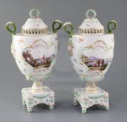 A pair of Meissen pot pourri vases and covers, late 19th century, each finely painted with figures