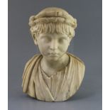 After the antique. An early 19th century marble bust of an Imperial Roman youth wearing a laurel