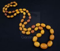 A single strand graduated oval amber bead necklace, gross weight 85 grams, 95cm.