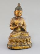 A Chinese gilt lacquered bronze figure of Buddha, 18th/19th century, H. 7.3cm, repair to neck