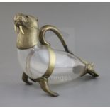 A Victorian novelty nickel mounted glass claret jug, modelled as a walrus, (ex silver plated?), with