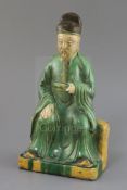 A Chinese sancai ridge tile modelled as the seated figure of Guandi, Ming dynasty, H. 30cmex