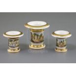 A rare Rockingham miniature garniture of three vases, c.1826-30, each painted to a central the