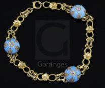 A 9ct gold, turquoise and diamond set fancy link bracelet, set with three inset diamond turquoise