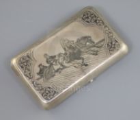 A late 19th century Russian 84 zolotnik silver and niello cigarette case, decorated with troika