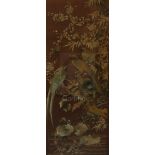 A Chinese embroidered silk picture of birds, late 19th century, woven with birds amid prunus and