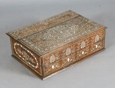 A 19th century Indian ivory inset hardwood writing slope, decorated with dense foliate scrolls and