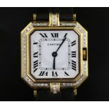 A lady's 18ct gold and diamond set Cartier quartz octagonal cased wrist watch, with Roman dial and