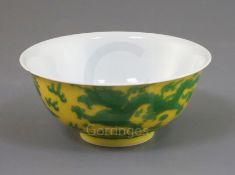 A Chinese yellow and green enamelled 'dragon' bowl, Qianlong seal mark and of the period (1736-95)