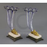 A pair of Bohemian blue flashed glass cornucopia vases, 19th century, each trumpet shaped vessel,