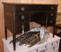 A mahogany kneehole table, fitted five drawers W.108cm