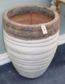 A large ribbed garden planter H.63cm