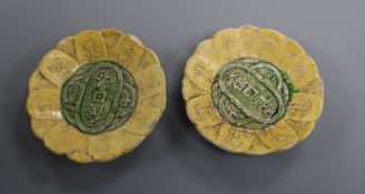 A pair of Oriental pottery coin dishes diameter 9cm