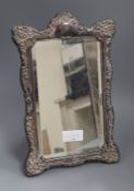 A modern repousse silver shaped rectangular photograph frame, Carr's of Sheffield Ltd, Sheffield,