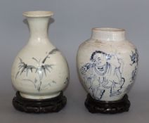 A Chinese Swatow blue and white bottle vase, late Ming and a Chinese blue and white jar tallest 18.
