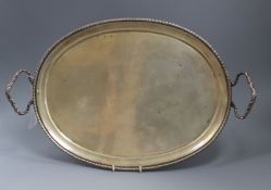 An Italian 800 standard white metal oval tray, with ribbon-twist edge and handles, Colgnato, Padova,