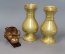 A pair of gilt metal ecclesiastical vases and a miniature jug and dish on stand