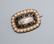A William IV yellow metal, enamel and split pearl family mourning brooch with inscription "James
