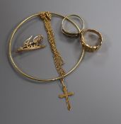 A 750 yellow metal initial brooch and wire bangle, a cross on 18ct gold chain, an 18ct gold ring and