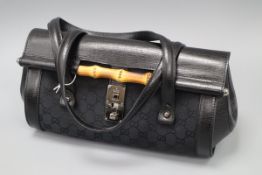 A Tom Ford for Gucci Bamboo Bullet Bag, GG monogram black canvas and leather trim, with dust bag (