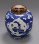 An 18th century Chinese blue and white jar and cover, the cover with inlaid jade plaque overall