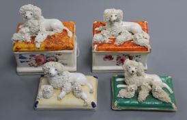 A Staffordshire porcelain 'poodle and puppies' inkbox, a similar box and cover and two covers, c.