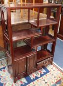 A Chinese hardwood freestanding shelf unit W.76cm