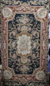 An Aubusson-style tapestry panel and a table cover