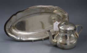 An Italian 800 standard silver teapot with pine cone finial and a similar oval tray with shaped