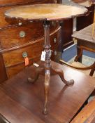 A George III-style tilt top tripod wine table 57cm diameter