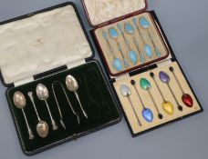 A saced set of six Norwegian white metal and enamel coffee spoons, one other silver set and an