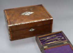 A Victorian mother of pearl and kingwood banded work box and a cased part set of drawing