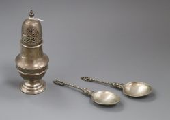 An Edwardian Asprey & Co silver sugar caster, London 1908 and two continental white metal spoons.