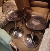 A pair of contemporary Danish design perspex and chrome bar stools