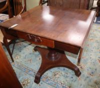 A 19th century North European mahogany drop flap centre table on pillar and platform base W.88cm