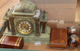 A French onyx mantel clock, two cigarette boxes and two nutshell vases