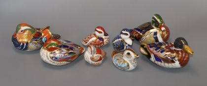 A collection of eight Crown Derby duck paperweights