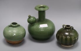 A Chinese green glazed kendi and two jars tallest 23cm