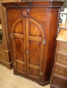 A George III mahogany standing corner cabinet W.97cm